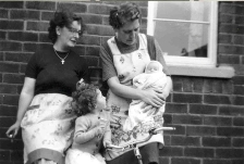 Barnsley, South Yorkshire. 1958
"1958 Mam (Rose Ward nee Brocklebank) \
Mrs Rogerson (Next door neighbour and very good friend) Holding baby me.\
Rosemary Ward my sister"

