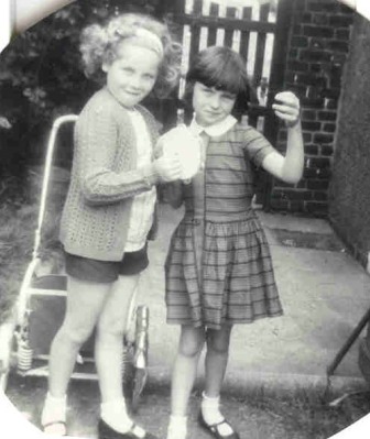 Nelson Sq
Patricia Ward, Elisabeth Wilson we must have been to the beach tha day or just on our way the Tanside is out 

